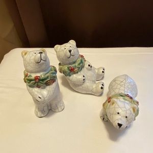 Three cute Christmas themed polar bears